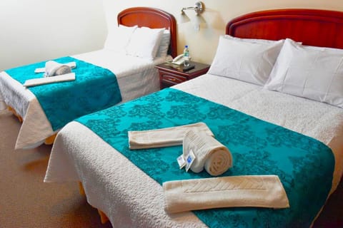 Triple Room, Multiple Beds | Desk, iron/ironing board (on request), WiFi (free), bed sheets