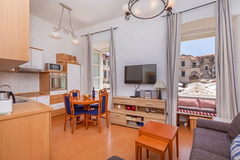 Standard Apartment | Living area | Flat-screen TV