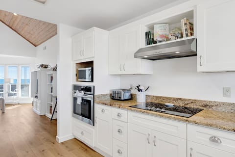 Stainless appliances and stone counters throughout