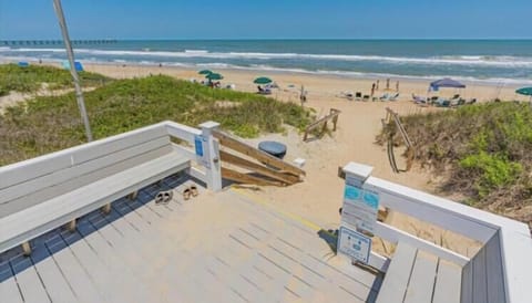 Ships Watch Community Beach Access offers direct access to pristine sandy shores and the calming ocean waves, just steps from your rental.