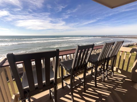 Beachfront retreat featuring sweeping ocean views from the patio—perfect for sunset dinners by the sea or savoring your morning coffee to the sound of the waves