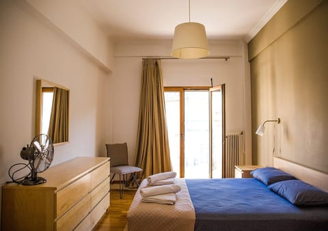 The main bedroom with the private balcony
