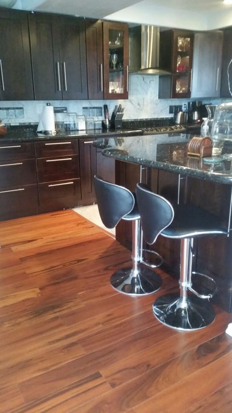Kitchen with bar counter that seats two