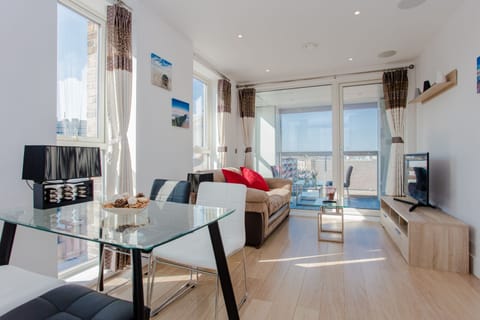 The open plan living room with Italian convertible sofa, new Samsung 43” UHD TV