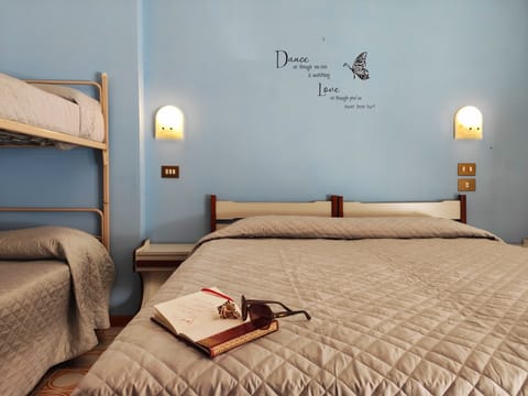 Standard Quadruple Room, Partial Sea View | Hypo-allergenic bedding, in-room safe, desk, laptop workspace