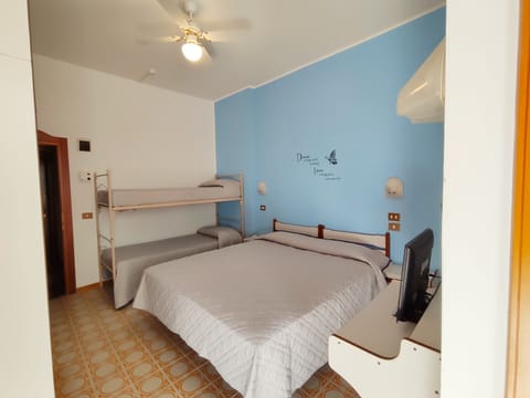 Standard Quadruple Room, Partial Sea View | Hypo-allergenic bedding, in-room safe, desk, laptop workspace