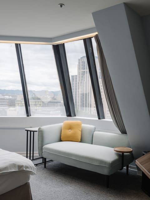 Deluxe Double Room, City View | Living area | 32-inch LED TV with cable channels, TV