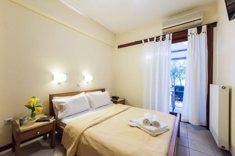 Family Apartment, Garden View | Premium bedding, minibar, in-room safe, blackout drapes