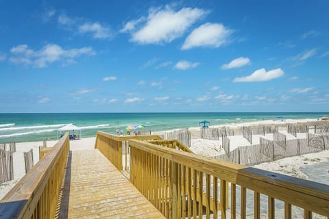 Step onto Cape San Blas's most unspoiled stretch — white sand, turquoise Gulf water, and nothing between you and the horizon. This is the beach right outside your door.
