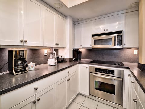 Stainless steel appliances in the kitchen.