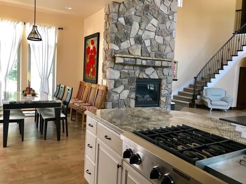 Kitchen with view of the gas fireplace.