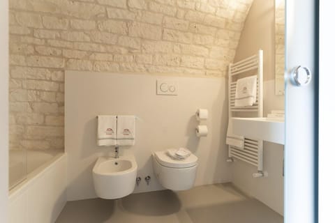 Jetted tub, rainfall showerhead, free toiletries, hair dryer