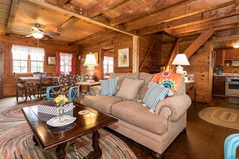 Relax on the sofa- perfectly situated in front of the fireplace