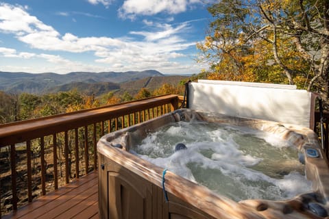 Soak your cares away in the bubbling hot tub as you enjoy mountain views.