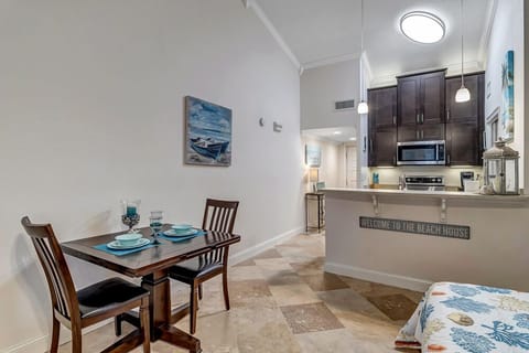 - Compact dining nook set for two with tasteful coastal decor and overhead lighting
- Ideal for breakfast, evening meals, or working remotely with a peaceful ambiance
- Easy access to kitchen and bedroom makes every corner feel intentional and useful