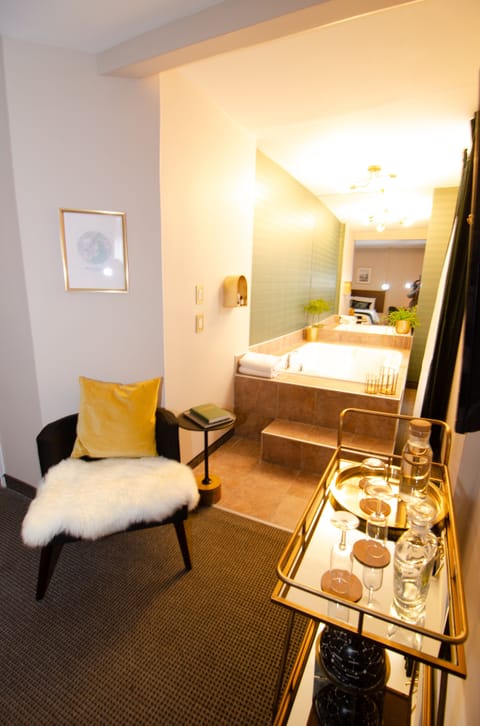 Deluxe Room, Jetted Tub | In-room safe, iron/ironing board, free WiFi, bed sheets