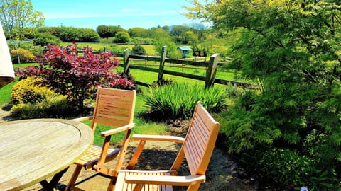 Sunny patio, perfect for lazy breakfasts.