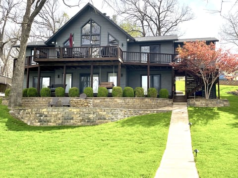 Back of house with just a few steps to the dock.