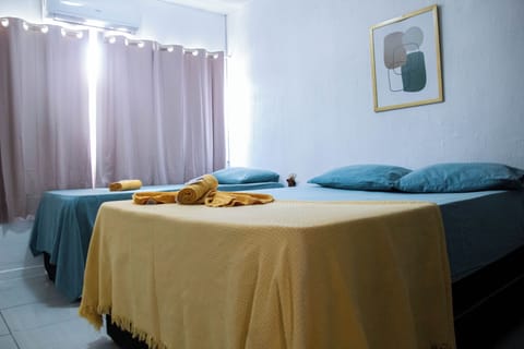 Basic Quadruple Room | Minibar, blackout drapes, free WiFi, bed sheets