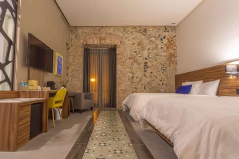 Premium bedding, down comforters, minibar, in-room safe