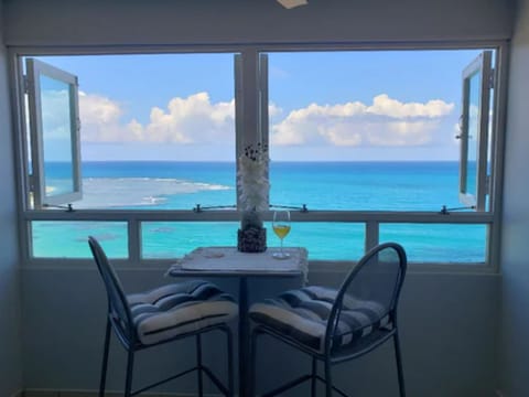 Apartment, Sea View | Living area | TV