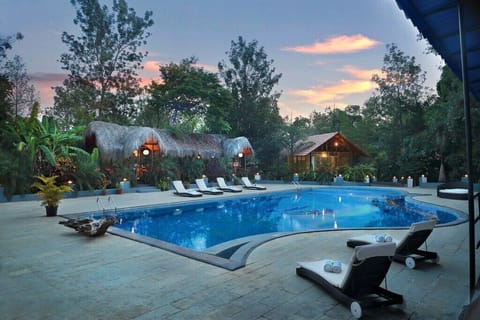Outdoor pool, open 7:30 AM to 7:00 PM, lifeguards on site