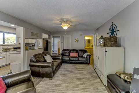 Beautifully Decorated Living Area with Flat Screen TV