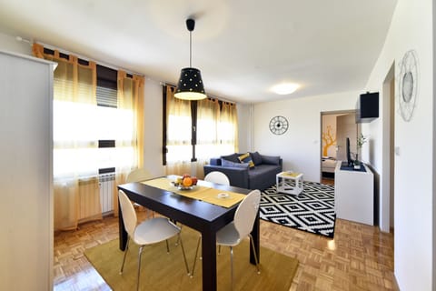 Apartment, 2 Bedrooms | Living area | Flat-screen TV