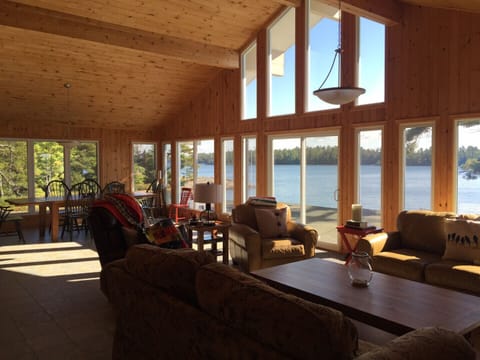 Expansive open concept lodge style cottage, with beautiful views of the lake.