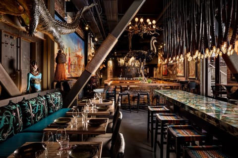 3 bars/lounges, tapas bar, gastropub, rooftop bar
