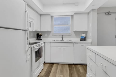 Full size appliances, ample counter and cabinet space, and an open concept with a view of the Estero Bay!