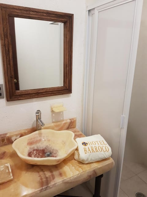 Shower, towels, soap, shampoo