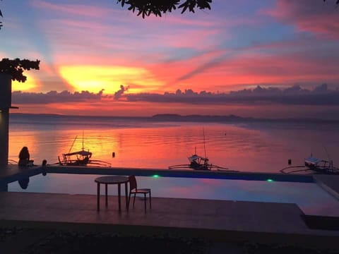 Outdoor pool, open 6:30 AM to 10:00 PM, sun loungers