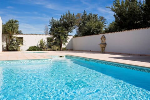 Take in gorgeous views while lounging around the on-site outdoor pool.