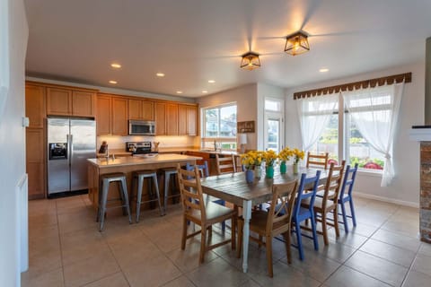 Gather around this large dining table for a great meal or a rousing board game!