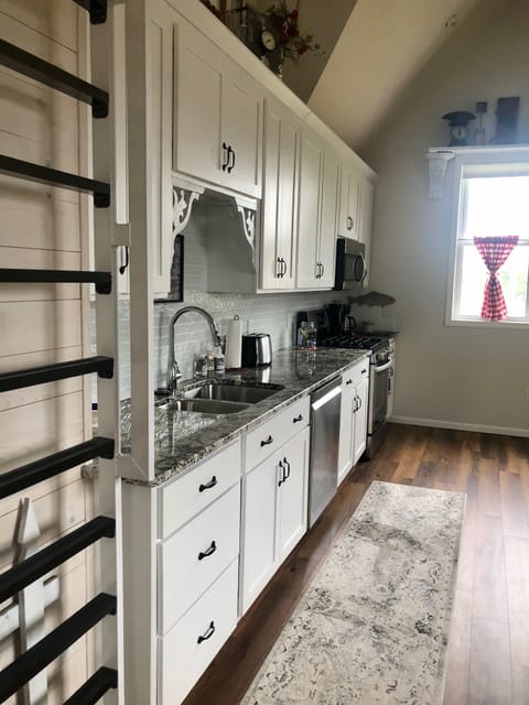 Ship's ladder to loft for those who brave it.