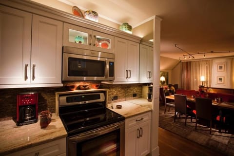 The fully appointed kitchen is beautifully lit.