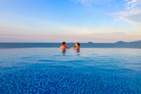 Outdoor pool, pool umbrellas, sun loungers
