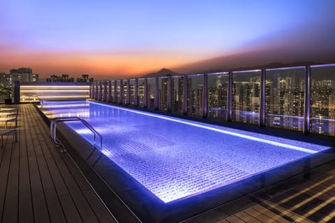 Seasonal outdoor pool, open 7:00 AM to 9:00 PM, lifeguards on site