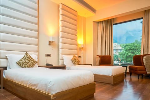 Premium bedding, memory foam beds, minibar, soundproofing