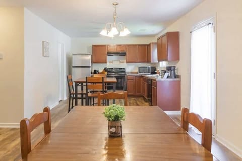 Two Dining Tables and Fully-Equipped Kitchen