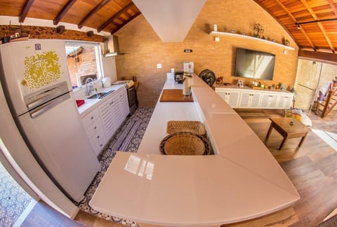Villa | Private kitchen | Full-size fridge, microwave, oven, stovetop
