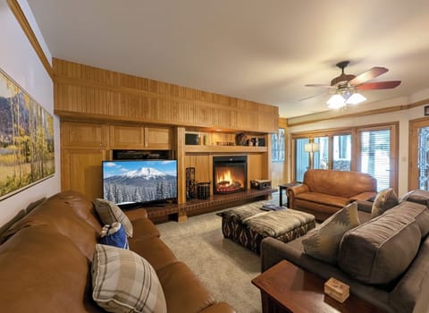 Unwind by the crackling wood burning fireplace and tv, perfect for a cozy evening