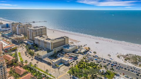 Whether you're lounging by the heated courtyard pool or walking to dinner on Mandalay Avenue, it is the ideal base for couples or small families seeking a peaceful beach escape.