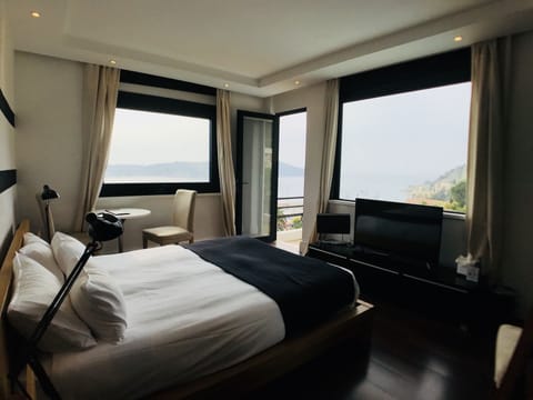 Family Suite, Connecting Rooms, Sea View | In-room safe, free WiFi, bed sheets