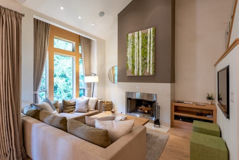 Main Floor - Living Room With Wood Burning Fireplace
