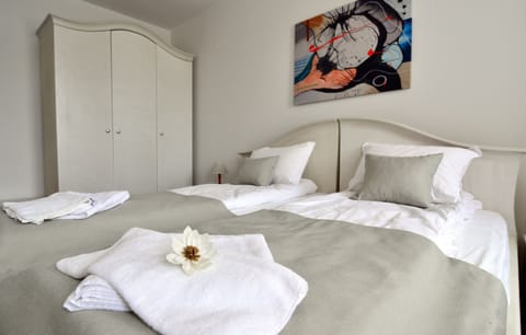 Classic Room, 2 Twin Beds, River View | In-room safe, blackout drapes, soundproofing, iron/ironing board