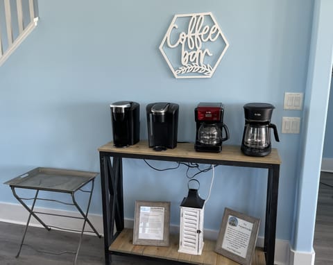 Coffe bar equipped with 4 coffee pots. 2 Keurigs and 2 Caraffes 