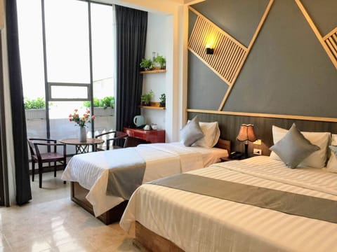 Deluxe Triple Room, City View | View from room
