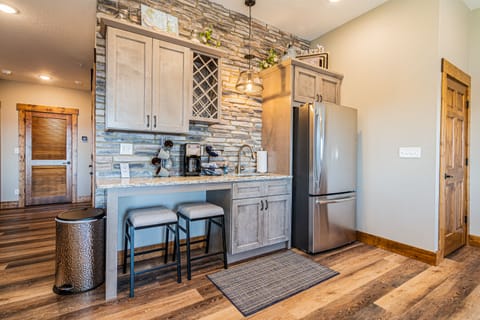 Lower level kitchen with a second fridge!